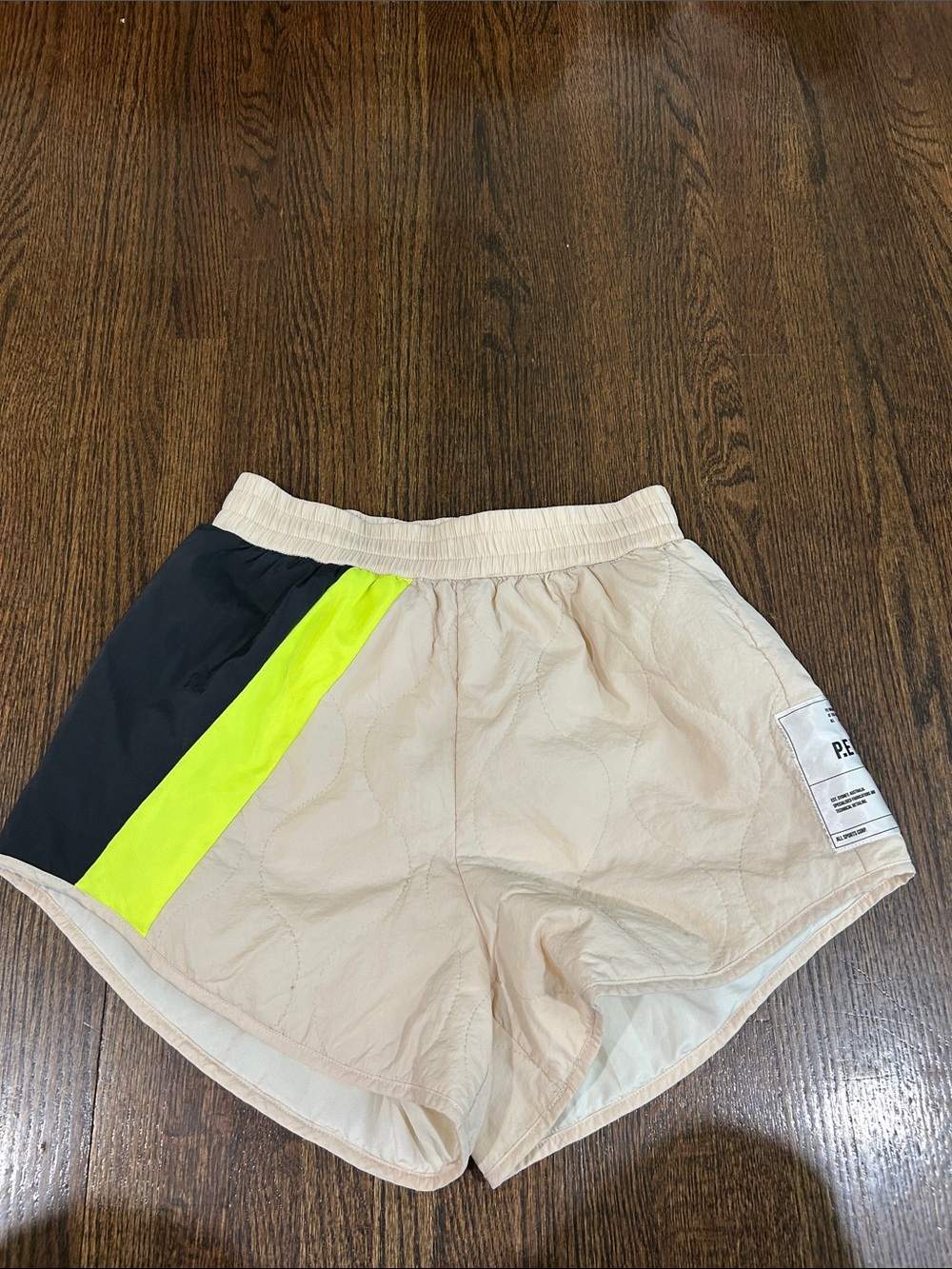 P.E Nation Cream Quilted Athletic Shorts with Black and Neon Yellow Stripe